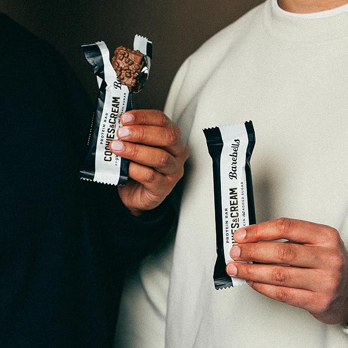 Barebells Protein Bars Cookies &amp Cream - 12 Count 20g High Protein Treats - Chocolate Nutrition Bar with 1g Total Sugars - On-The-Go Breakfast or Post-Workout Snack